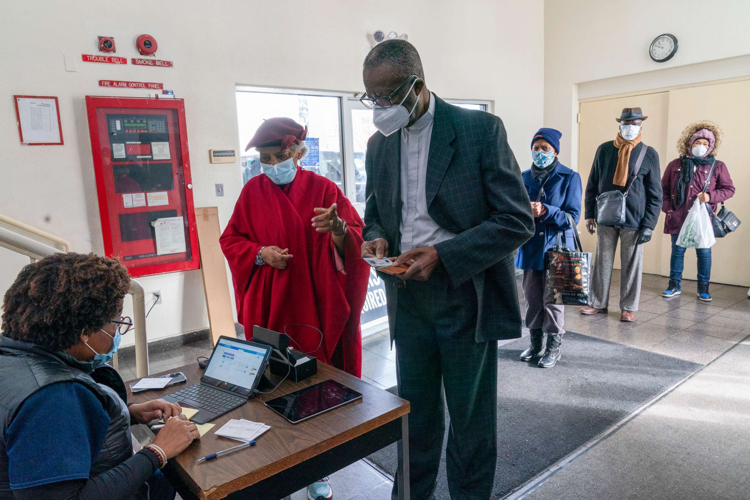 PHOTO: A medical worker registers Rev. Dr. Alfred Cockfield and Linette Cockfield for their first dose of the coronavirus vaccine at a pop-up COVID-19 vaccination site at the church, Feb. 3, 2021, in the Brooklyn borough of New York.