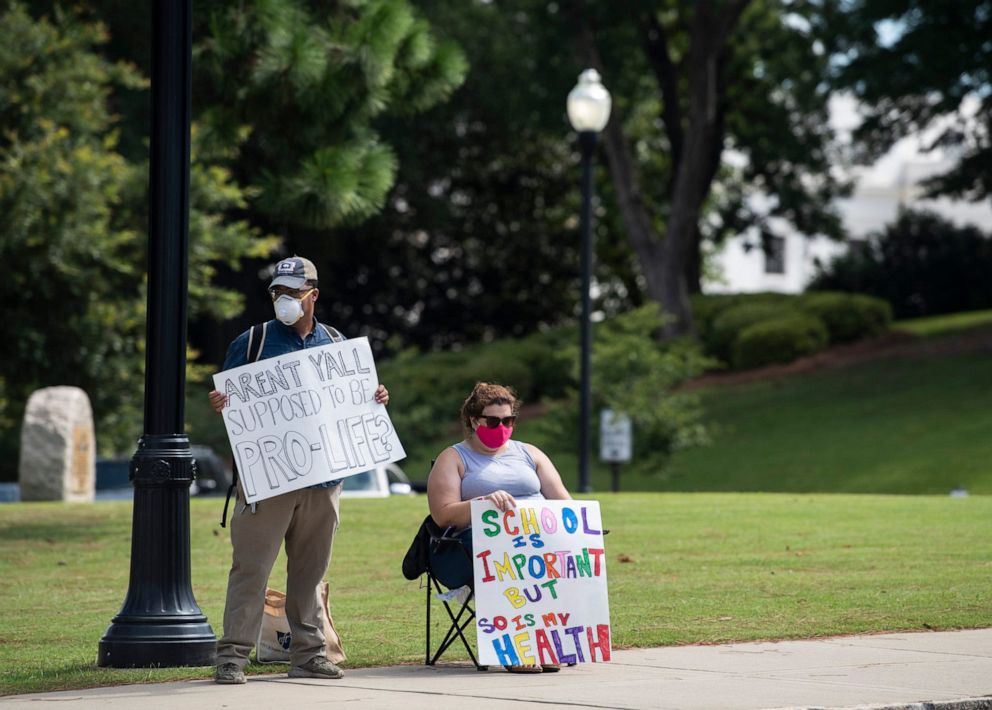 PHOTO: Alabama Teachers Against Covid-19 protest the reopening of schools amid the coronavirus pandemic on Dexter Ave. in Montgomery, Ala., on July 23, 2020.