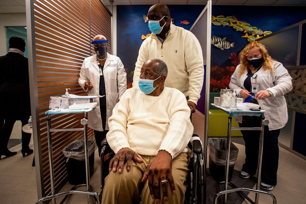 PHOTO: Baseball Hall of Famer Hank Aaron prepares to receive his COVID-19 vaccination on Tuesday, Jan. 5, 2021, at the Morehouse School of Medicine in Atlanta.