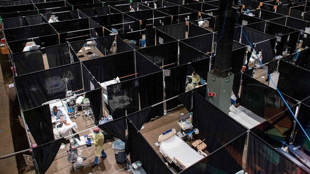 PHOTO: Medical staff monitor and treat sick patients infected with the Covid-19 virus at the UMASS Memorial DCU Center Field Hospital in Worcester, Mass., Jan. 13, 2021.