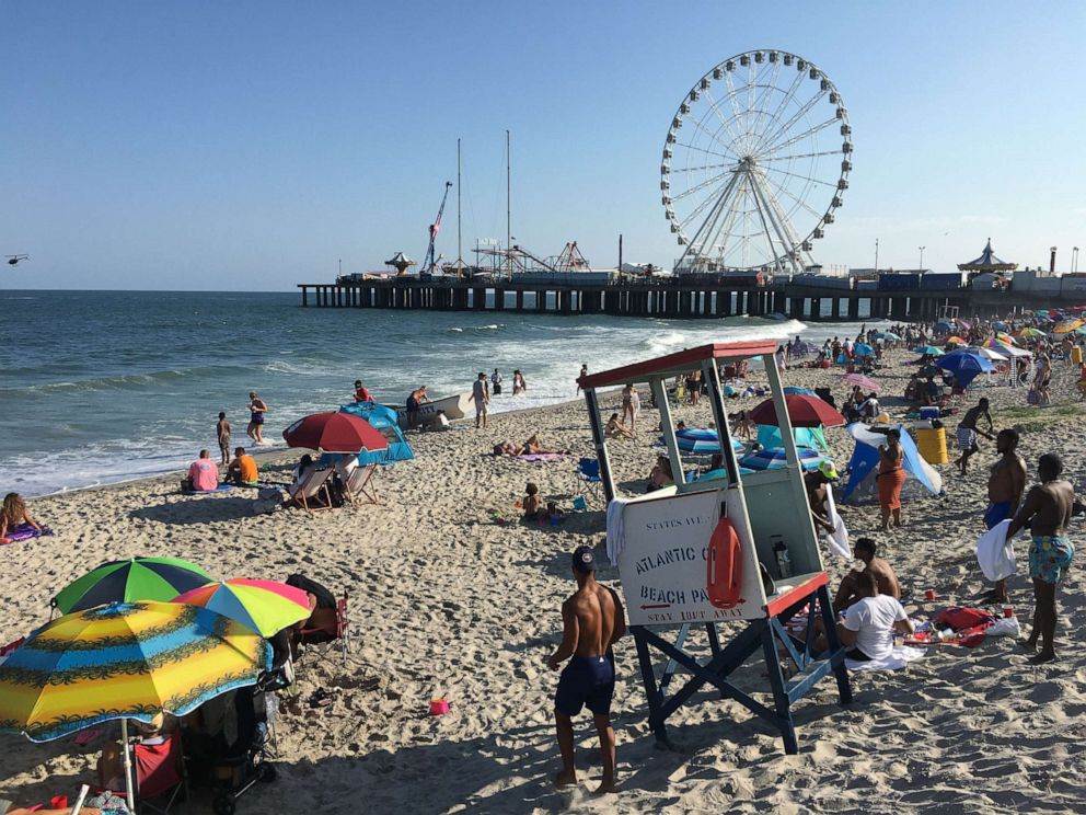 PHOTO: People gather on the beach in Atlantic City, N.J., for Independence Day holiday weekend, July 4, 2020.