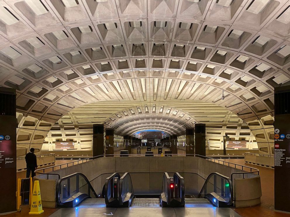 PHOTO: One person walks through the nearly empty Metro Center metro station on April 15, 2020, in Washington, D.C.