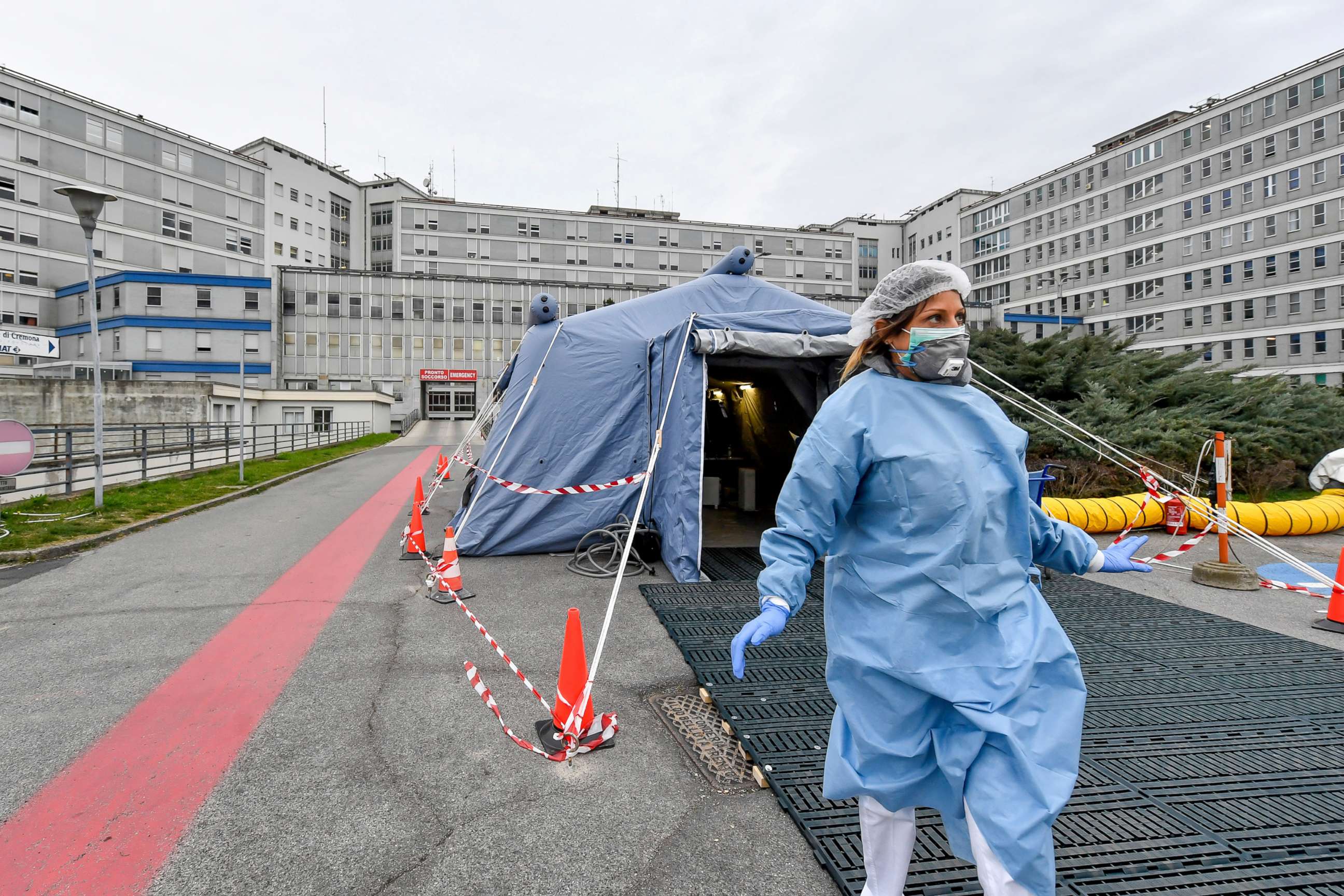 PHOTO: A paramedic walks out of a tent that was set up in front of the emergency ward of the Cremona hospital, northern Italy, Feb. 29, 2020. 