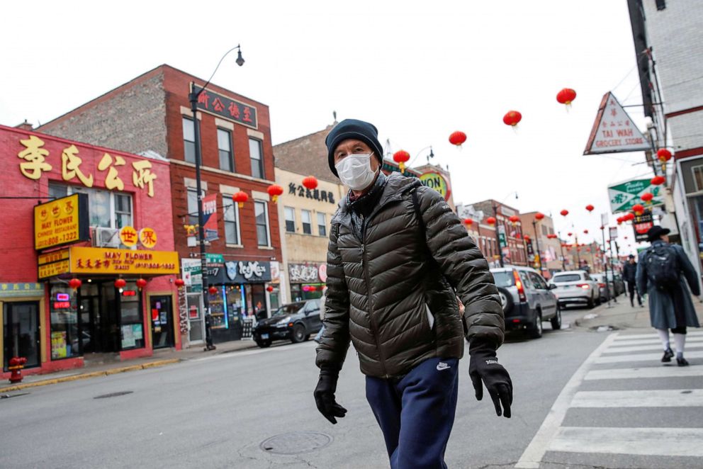 PHOTO: A man wears a masks in Chinatown following the outbreak of the novel coronavirus, in Chicago, Jan. 30, 2020.