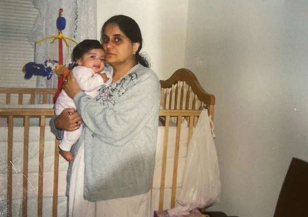 PHOTO: Madhvi Aya holds her daughter Minnoli in this undated handout photo provided by the family to Reuters on April 13, 2020.