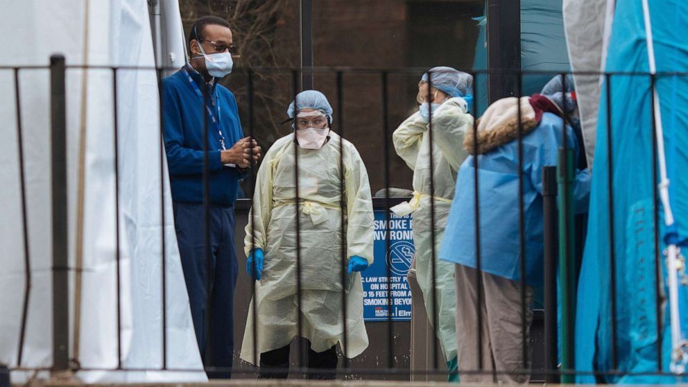 PHOTO: Medical staff outside the coronavirus testing facility at Elmhurst Hospital in Queens, New York, March 31, 2020.