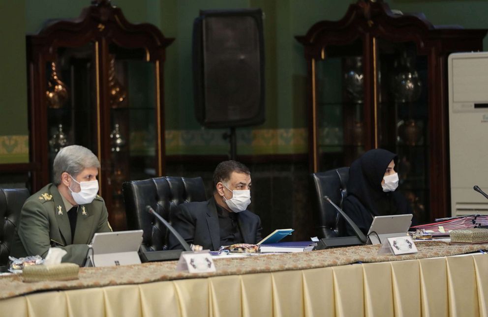 PHOTO: Iranian cabinet members wear protective masks as a means of protection against the cornonavirus COVID-19, during a cabinet meeting in Tehran, Iran, March 11, 2020.