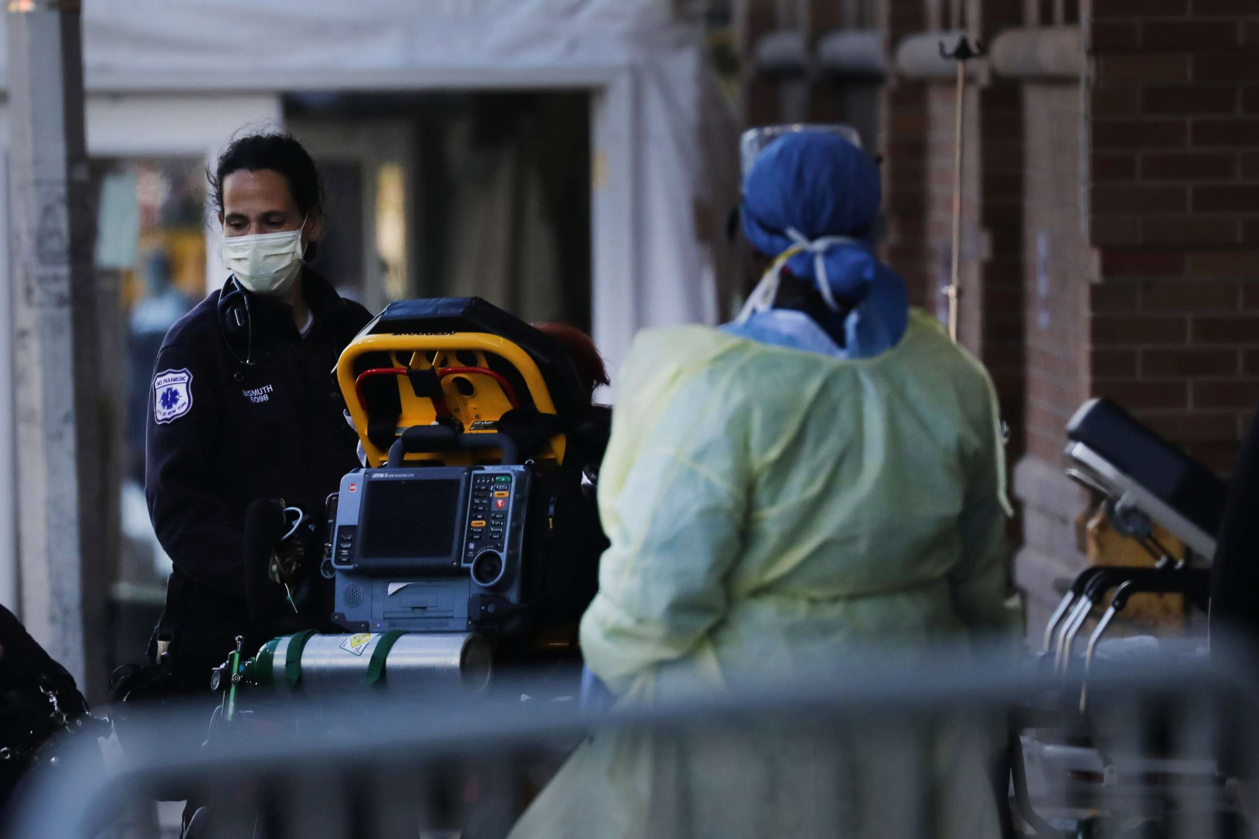 PHOTO: Medical workers take in patients outside of a special coronavirus intake area at Maimonides Medical Center, May 4, 2020, in Brooklyn, New York.