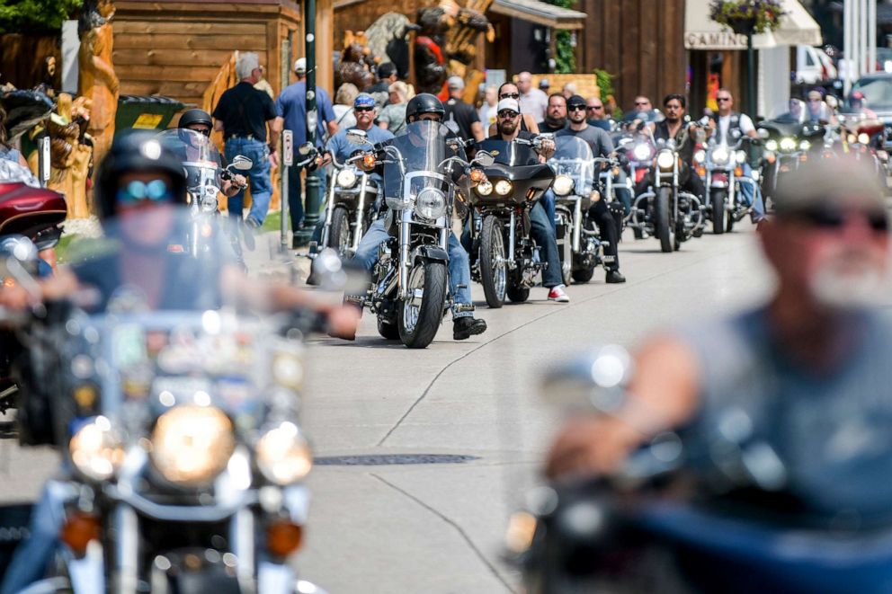 PHOTO: Motorcyclists ride through downtown Deadwood, S.D. during the 80th Annual Sturgis Motorcycle Rally, Aug. 8, 2020.