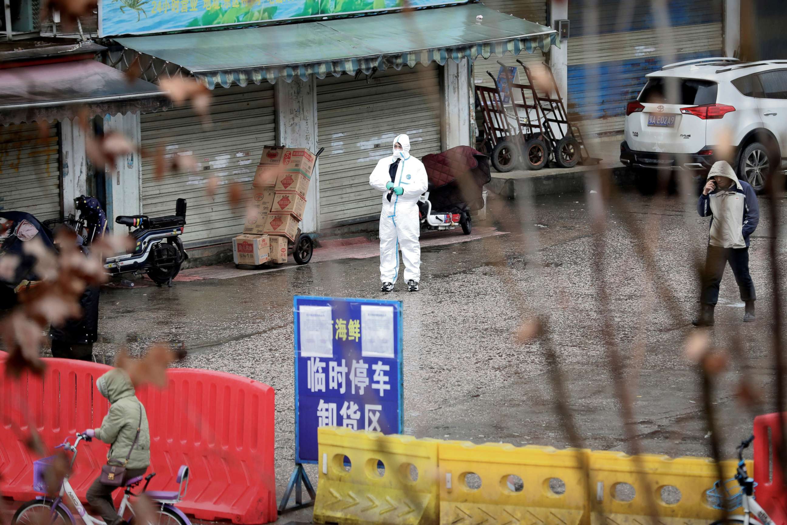 PHOTO: A worker in a protective suit is seen at the closed seafood market in Wuhan, China, Jan. 10, 2020. 