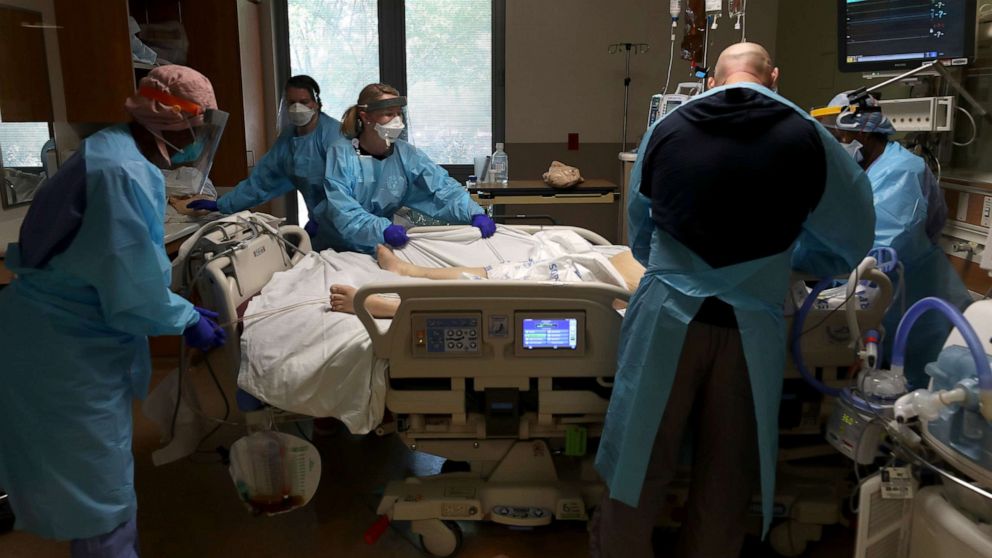 PHOTO: Nurses care for a coronavirus patient in the intensive care unit at Regional Medical Center on May 21, 2020, in San Jose, Calif.