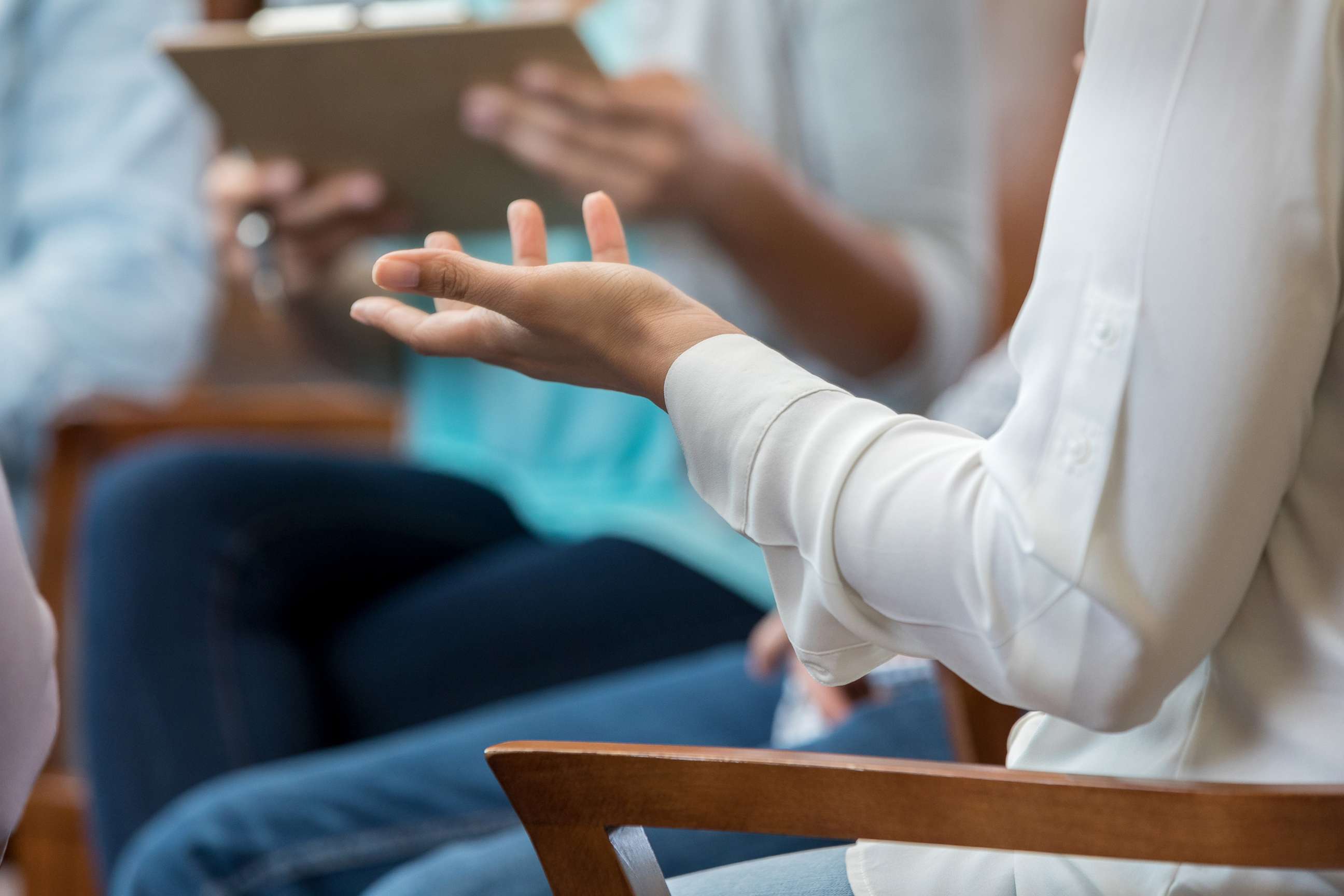 PHOTO: A woman gestures during a therapy session.