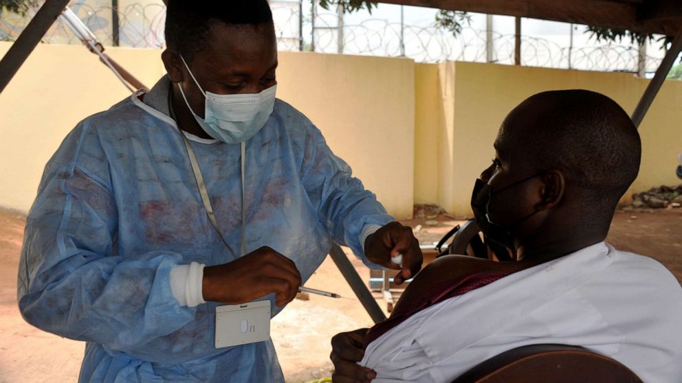 PHOTO: A nurse administers the COVID-19 vaccine to a man at a hospital in Accra, Ghana, on March 2, 2021.