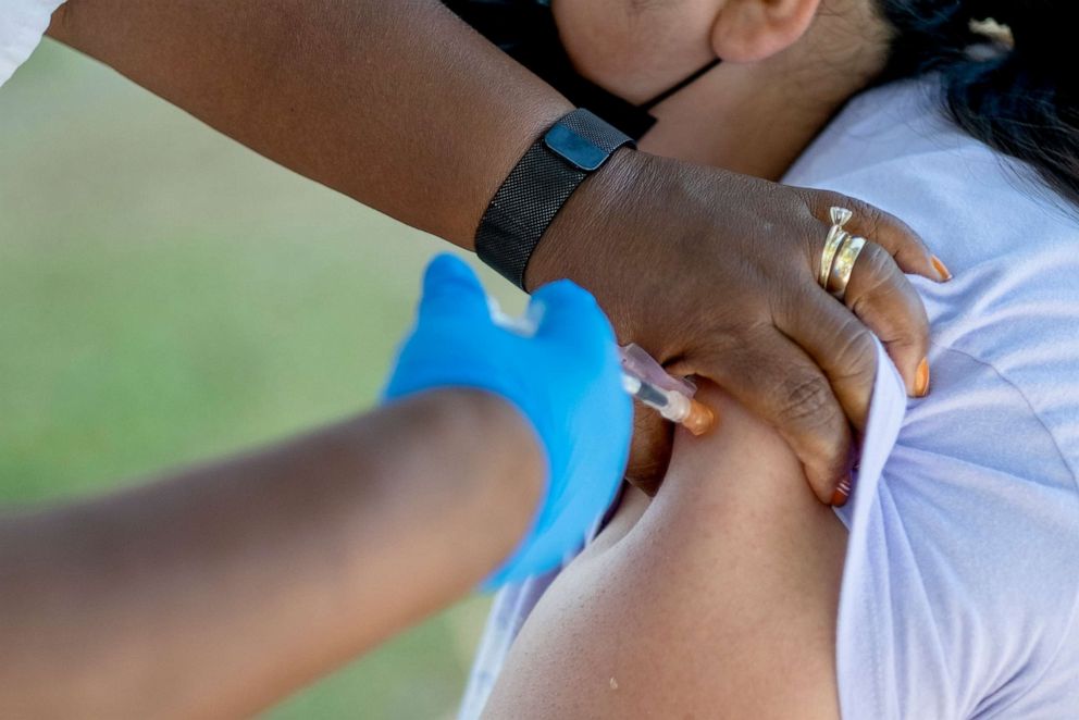 PHOTO: People receive booster shots during a COVID vaccination clinic at Villa Parke in Pasadena, Calif., on July 8, 2022.