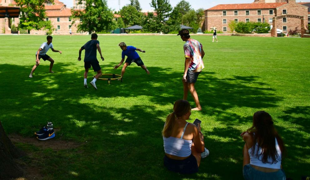 PHOTO: A group of incoming freshmen play spike ball on campus after moving into dormitories at University of Colorado Boulder on Aug. 18, 2020.