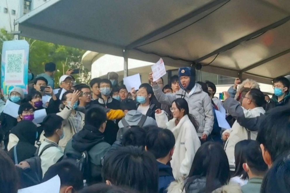 PHOTO: This frame grab from video footage made available via AFPTV on Nov. 27, 2022 shows students protesting against China's zero-Covid policy at Tsinghua University in Beijing.
