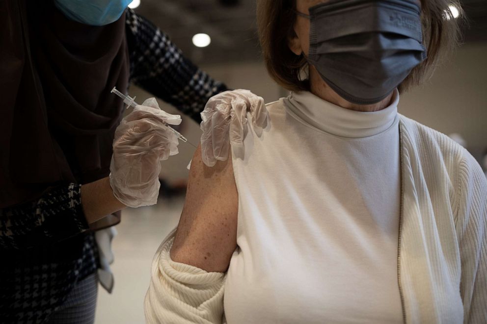 PHOTO: A resident receives a Covid-19 booster shots at a vaccine clinic in Lansdale, Pa., Apr. 5, 2022. 
