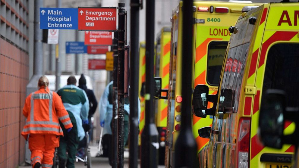 PHOTO: Paramedics unload a patient from an ambulance outside the Royal London Hospital in east London, Jan. 8, 2021.