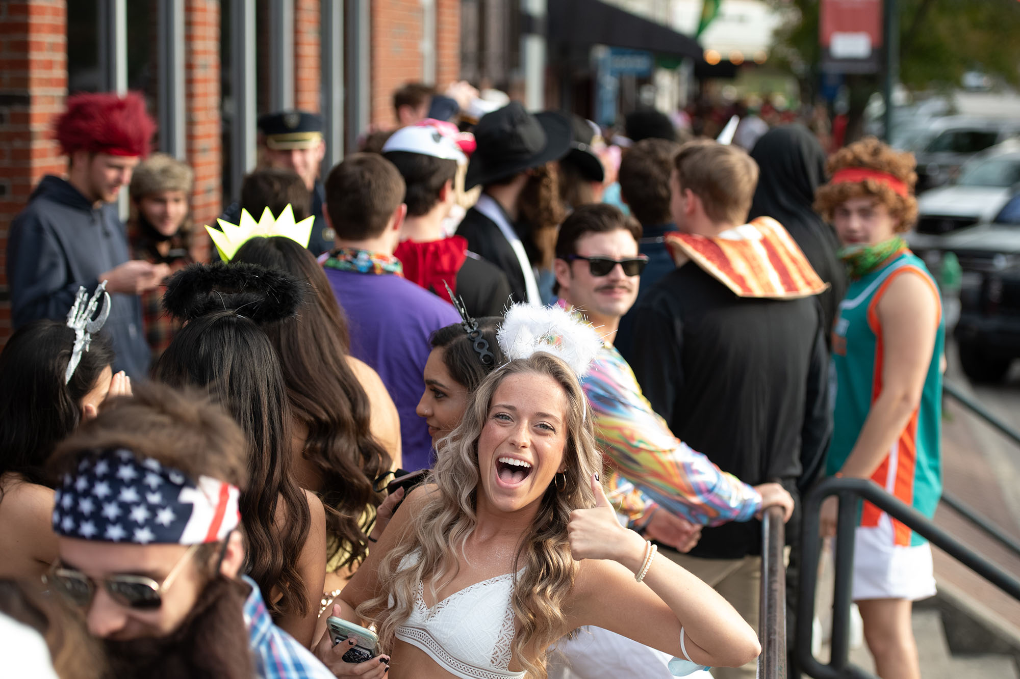 PHOTO: Halloween revelers stand in line for nightclubs in Five Points, a popular destination for college students at the University of South Carolina, in Columbia, S.C. on Oct. 31, 2020.
