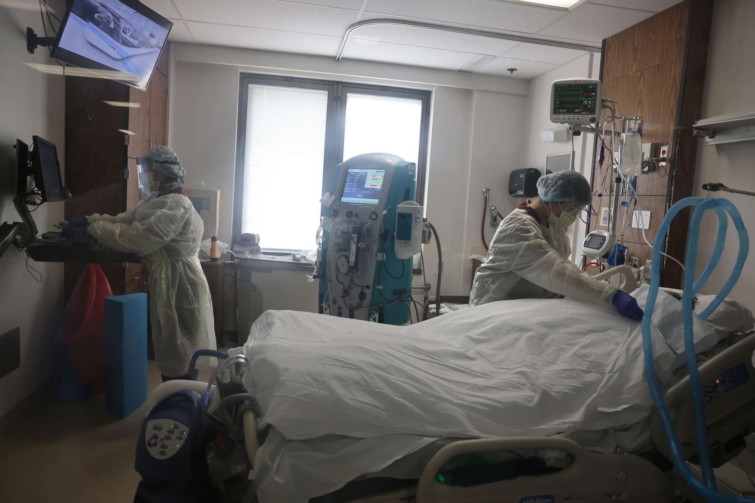 PHOTO: A nurse attends to a patient in the COVID-19 intensive care unit at Providence Saint Joseph Medical Center in Burbank, Calif., Nov. 19, 2020.