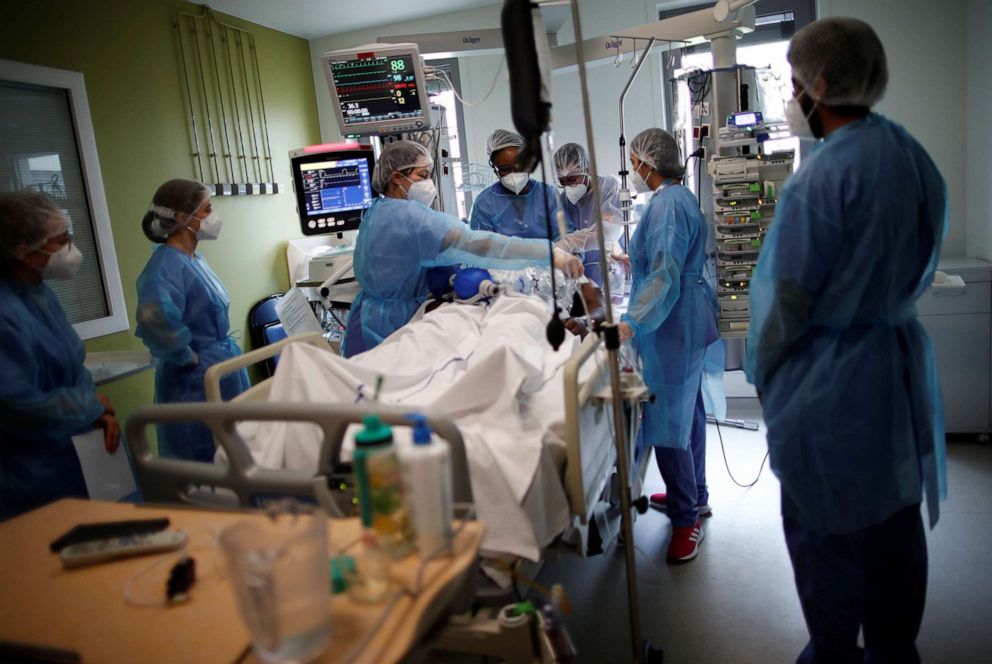 PHOTO: Medical staff members work in the Intensive Care Unit where patients suffering from COVID-19 are treated at the Melun-Senart hospital, near Paris, March 8, 2021.