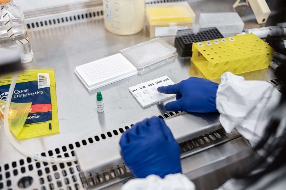 PHOTO: Mirimus, Inc. lab scientists work to validate rapid IgM/IgG antibody tests of COVID-19 samples from recovered patients on April 10, 2020, in the Brooklyn, New York.
