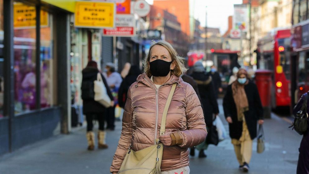 PHOTO: A woman wears a mask in north London, Jan. 19, 2022.