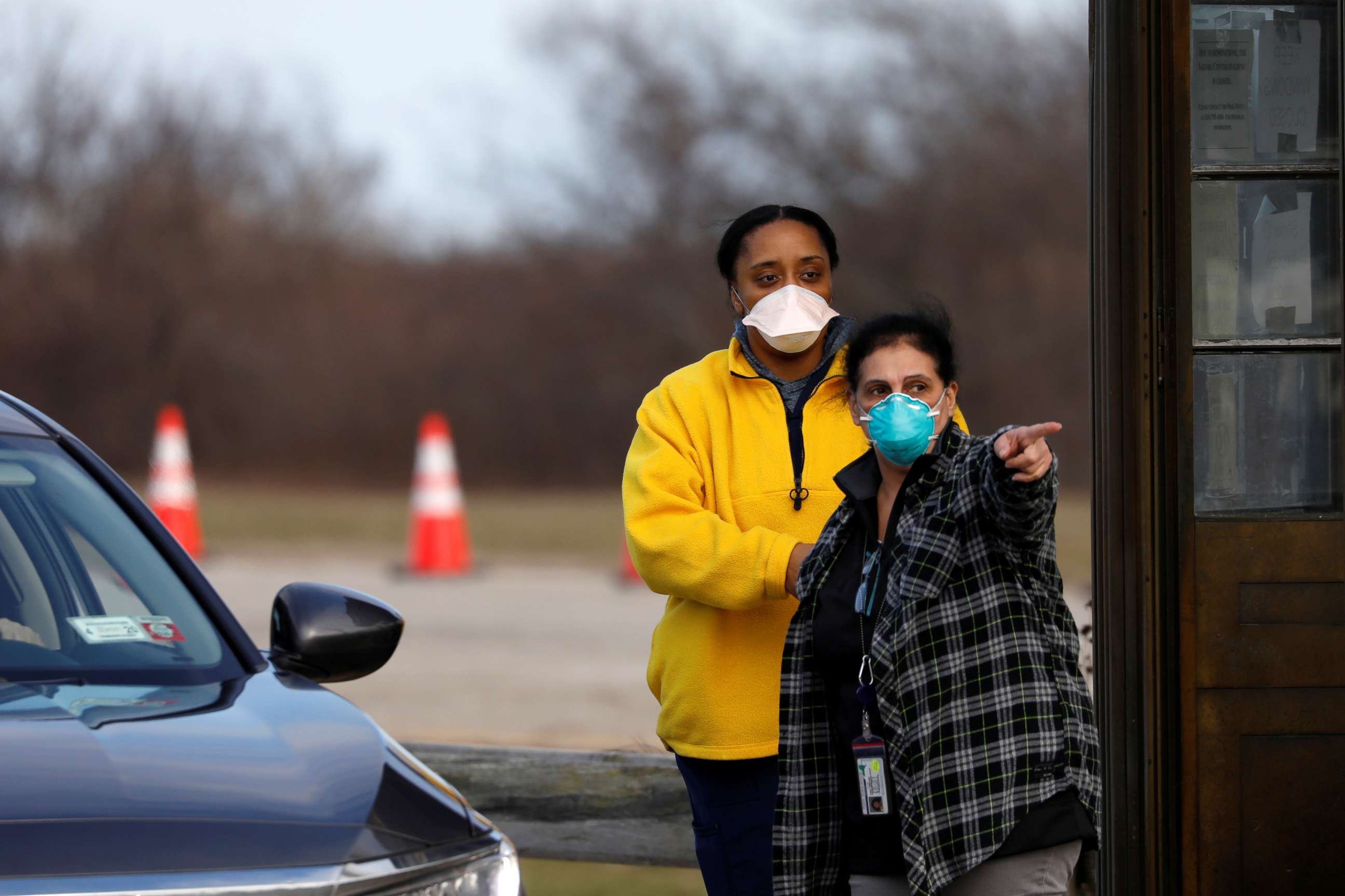 PHOTO: Workers direct traffic at a testing facility for coronavirus disease (COVID-19) in Jones Beach on Long Island in New York, March 17, 2020.