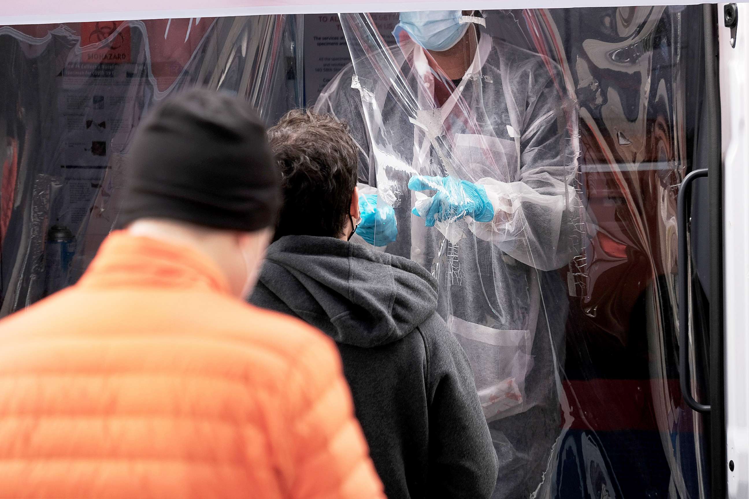 PHOTO: A medical worker administers tests at a Covid-19 testing site in Brooklyn, New York, April 18, 2022.