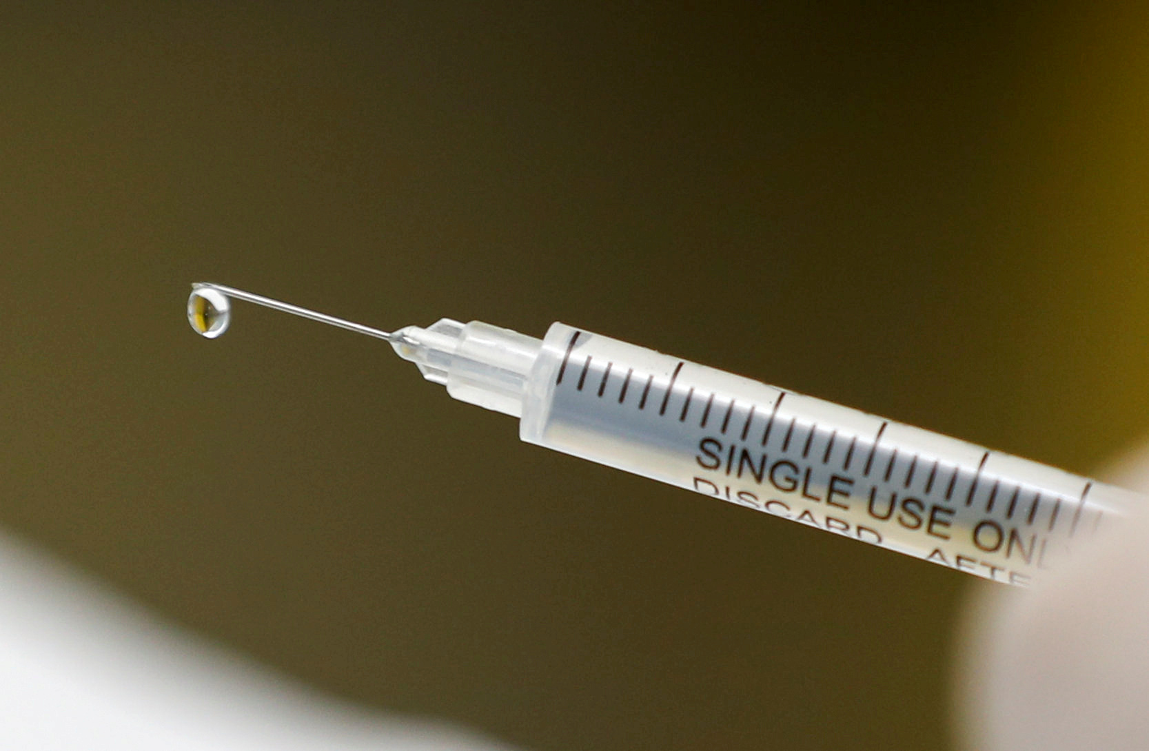 PHOTO: A syringe with a vaccine is seen ahead of trials by volunteers testing for the coronavirus disease (COVID-19), and taking part in the country's human clinical trial for potential vaccines in Johannesburg, South Africa, Aug. 27, 2020. 