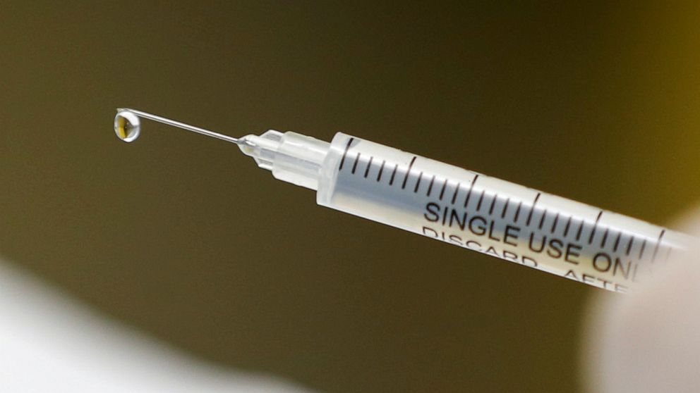 PHOTO: A syringe with a vaccine is seen ahead of trials by volunteers testing for the coronavirus disease (COVID-19), and taking part in the country's human clinical trial for potential vaccines in Johannesburg, South Africa, Aug. 27, 2020. 