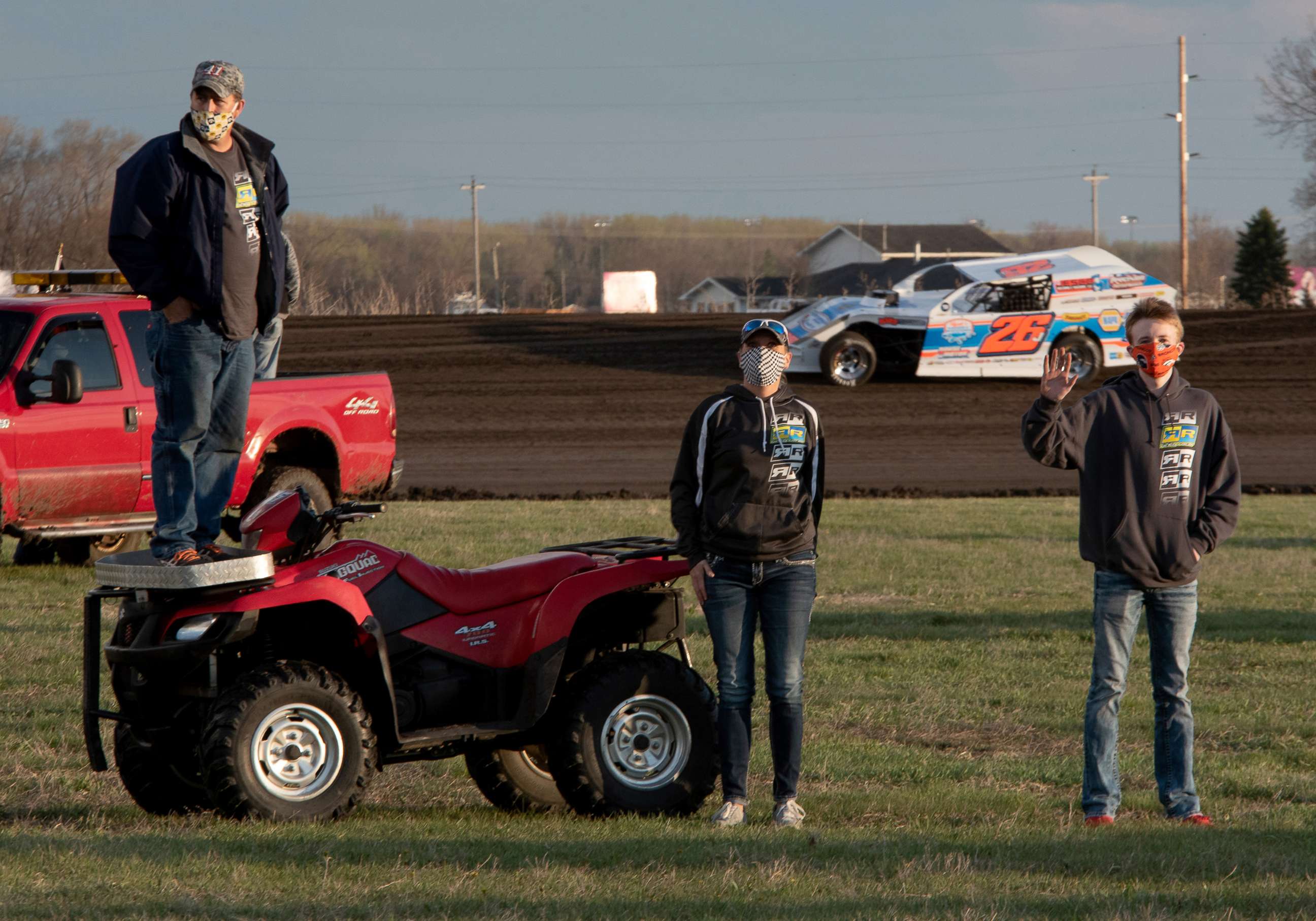 PHOTO: Members of the crew look on during the Open Wheel Nationals at Park Jefferson Speedway on April 25, 2020, in North Sioux City, S.D.