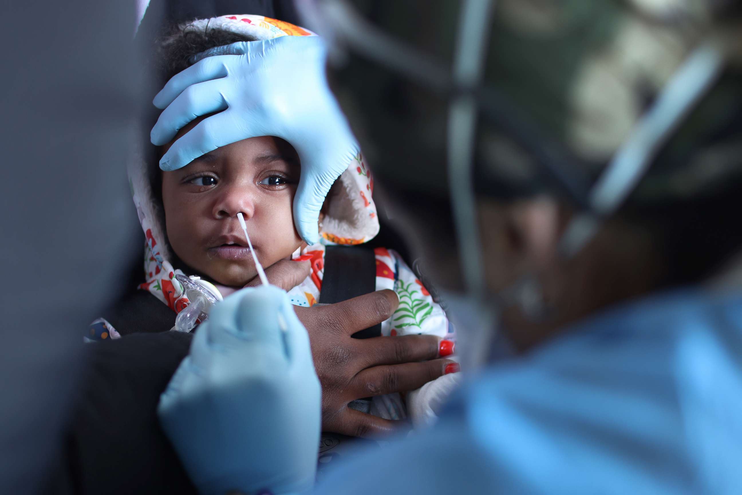 PHOTO: A child is tested for the COVID-19 virus at Roseland Community Hospital, Dec. 14, 2020, in Chicago, Illinois.