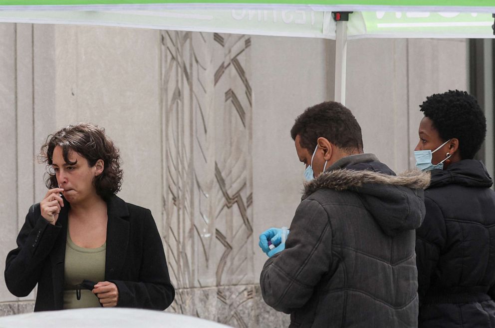 PHOTO: A woman takes a COVID-19 test at a pop-up testing site in New York, May 3, 2022.