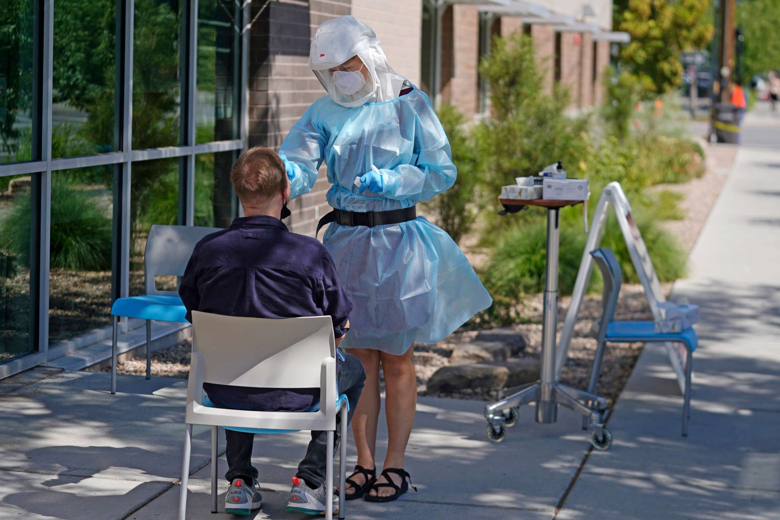 PHOTO: Clay Harris receives a COVID-19 test outside the Salt Lake County Health Department, July 22, 2022, in Salt Lake City.