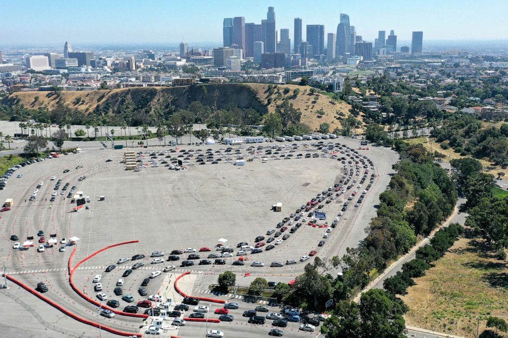 PHOTO: An aerial view of motorists lined up to be tested for COVID-19 in a parking lot at Dodger Stadium amid the coronavirus pandemic on July 10, 2020 in Los Angeles.