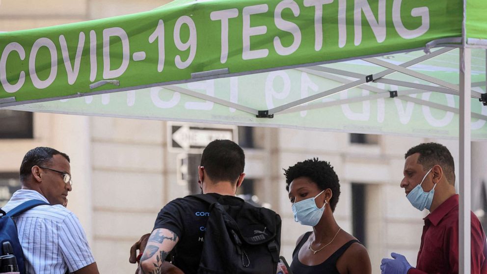PHOTO: People wait to take coronavirus disease (COVID-19) tests at a pop-up testing site in New York City, July 11, 2022.