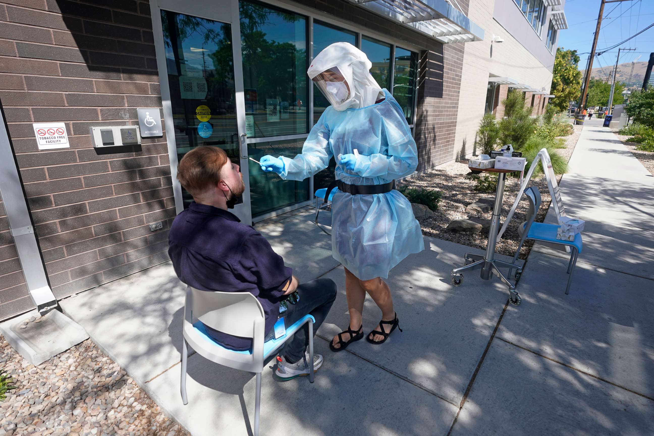 PHOTO: Clay Harris receives a COVID-19 test outside the Salt Lake County Health Department, on July 22, 2022, in Salt Lake City.