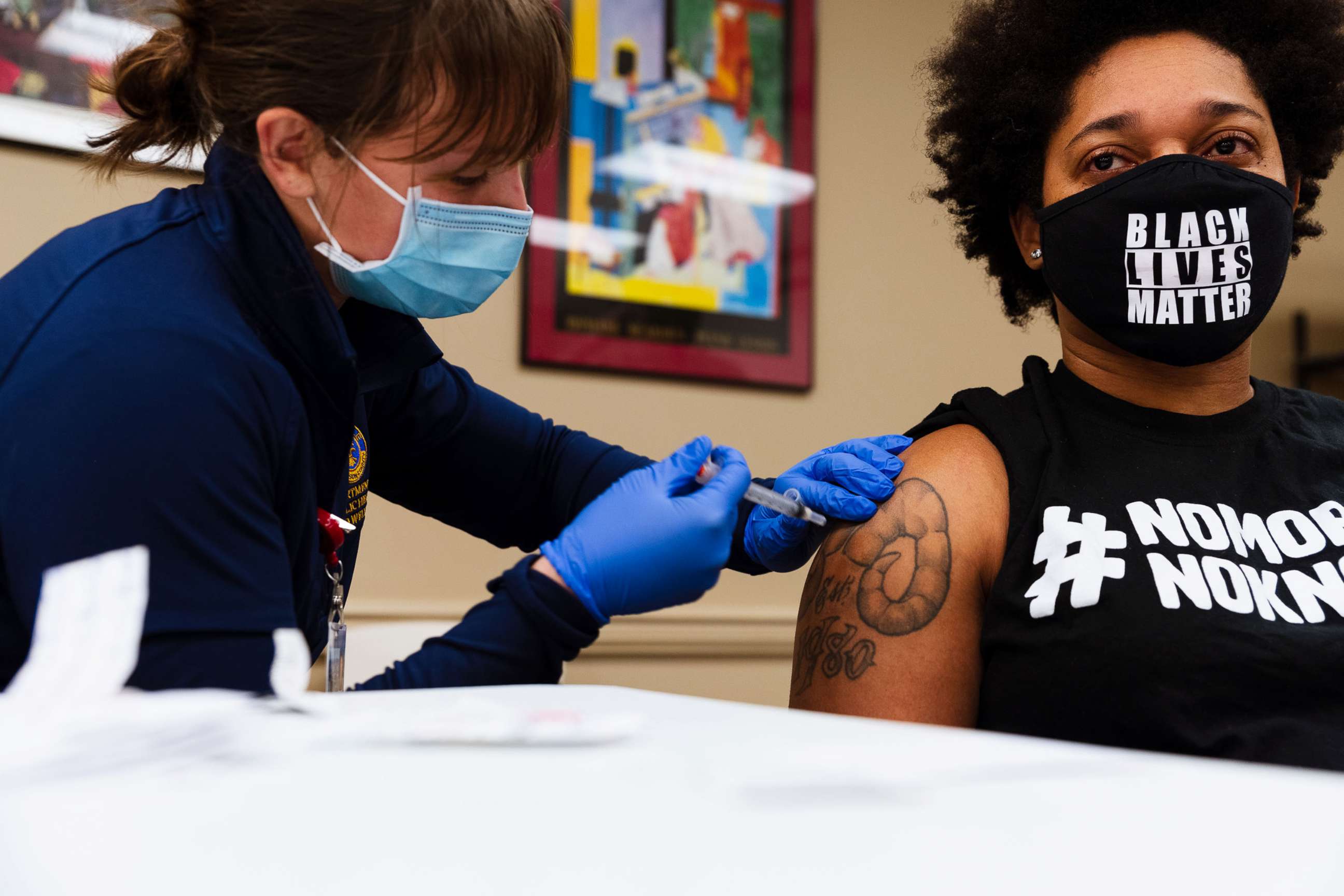 PHOTO: Keturah Herron of the ACLU receives a Moderna COVID-19 vaccination at the Louisville Urban League in Louisville, Ky, Jan. 20, 2021