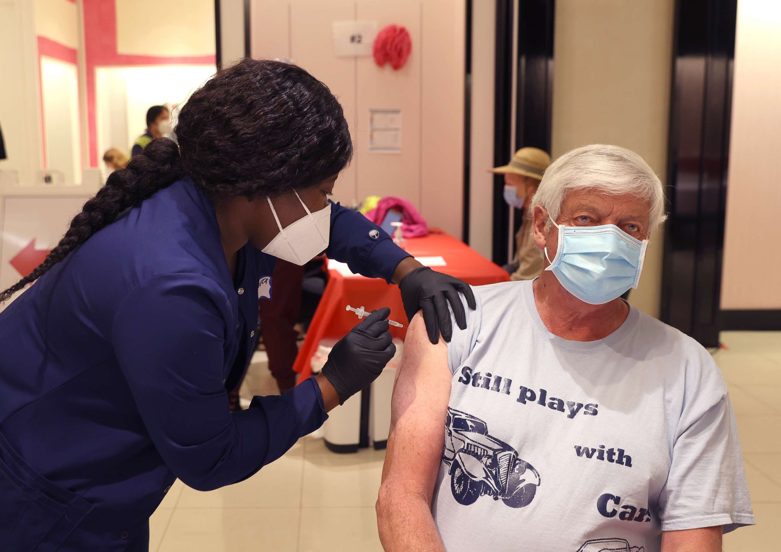 PHOTO: A registered nurse administers a COVID-19 booster vaccination to a person at a COVID-19 vaccination clinic on April 6, 2022, in San Rafael, Calif.