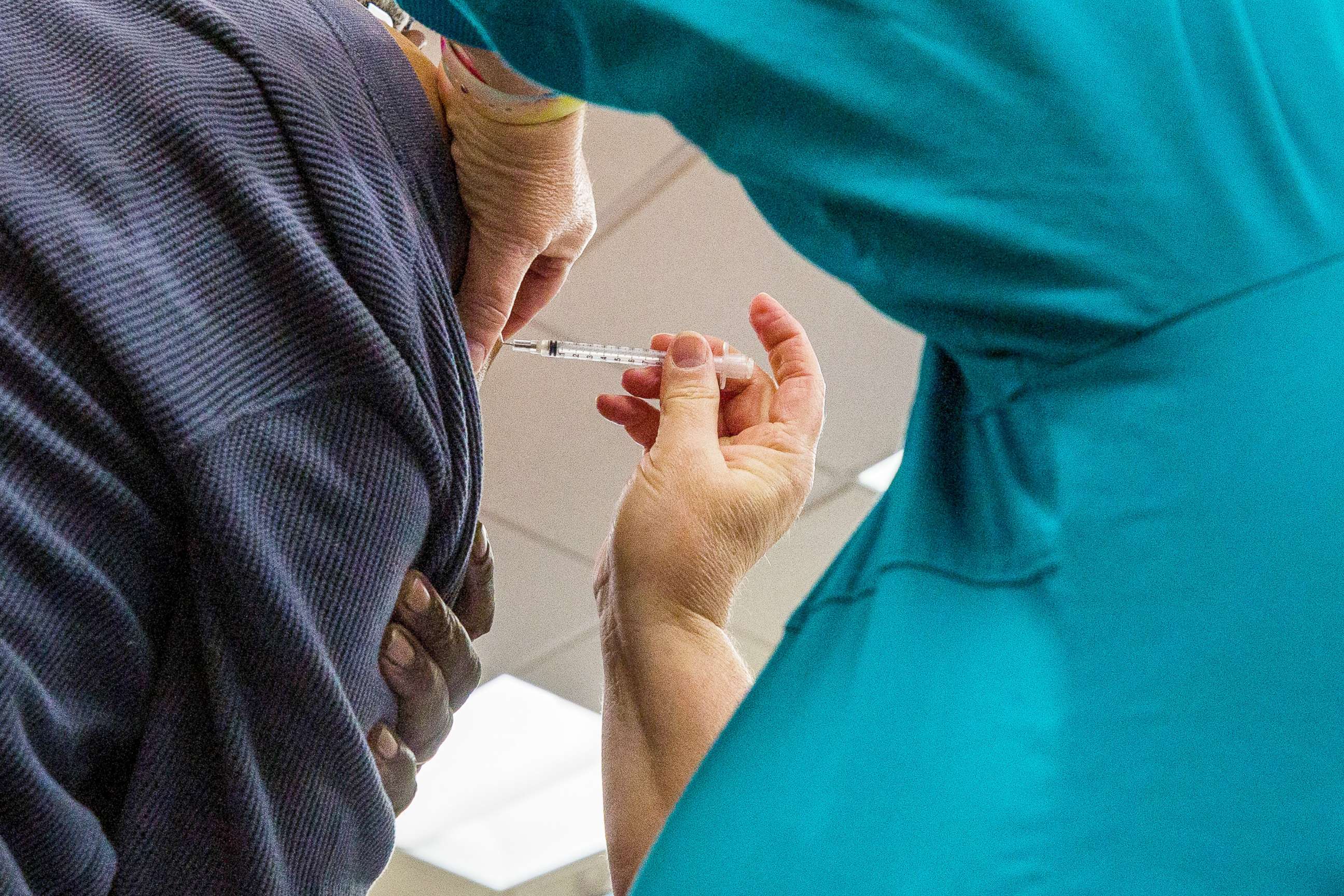 PHOTO: A patient receives the Pfizer-BioNTech vaccine at the McLeod Health Clarendon hospital in Manning, S.C., Feb. 17, 2021.