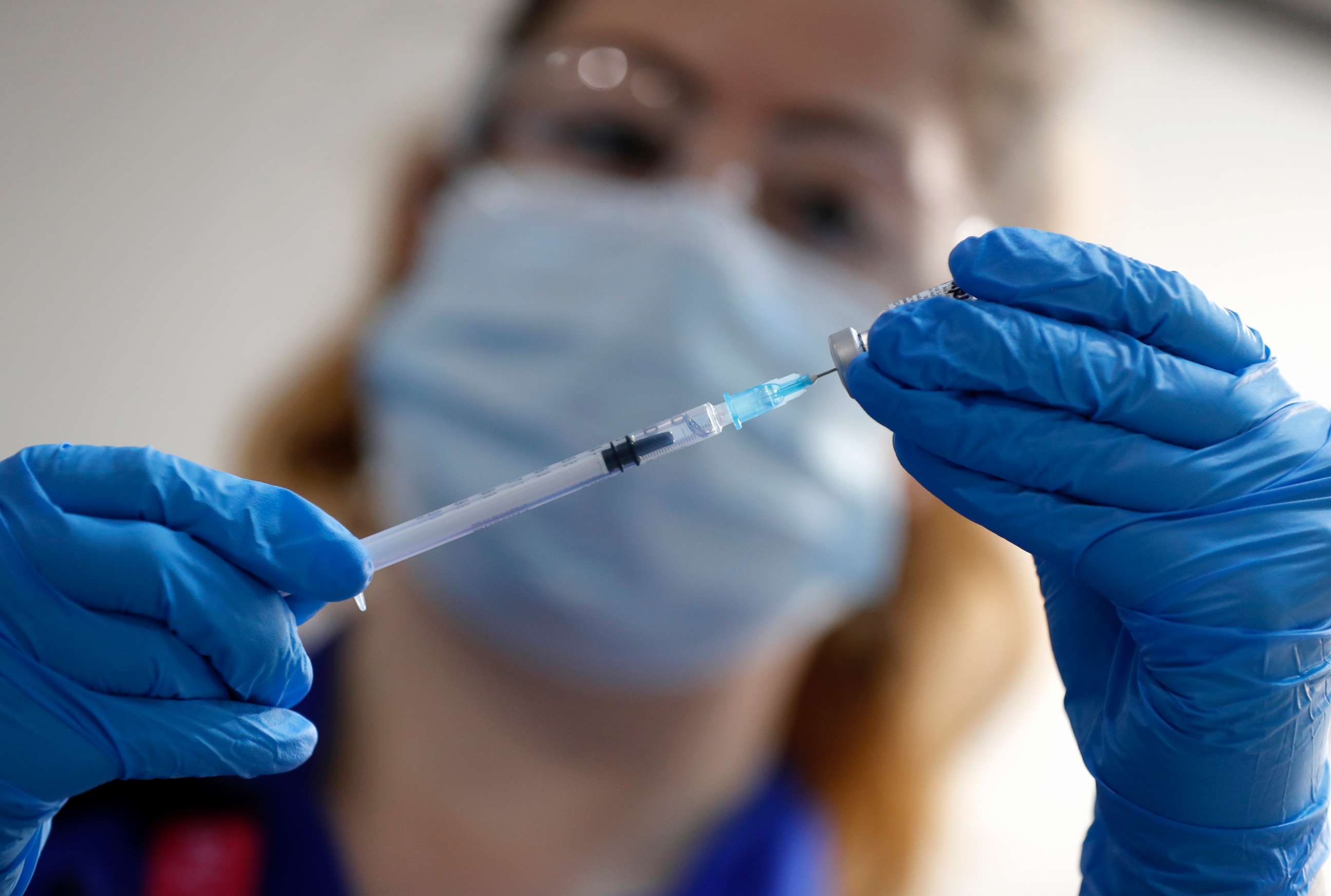 PHOTO: A nurse prepares a shot of the Pfizer-BioNTech COVID-19 vaccine at Guy's Hospital in London, Dec. 8, 2020, as the U.K. health authorities rolled out a national mass vaccination program.