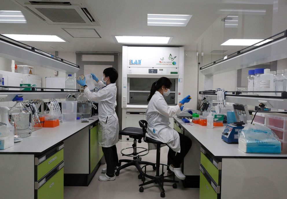 PHOTO: Thai medical technologists work inside a laboratory of the vaccine production process at the Siam Bioscience vaccine production plant, in Nonthaburi province, on the outskirts of Bangkok, Thailand, June 1, 2020.