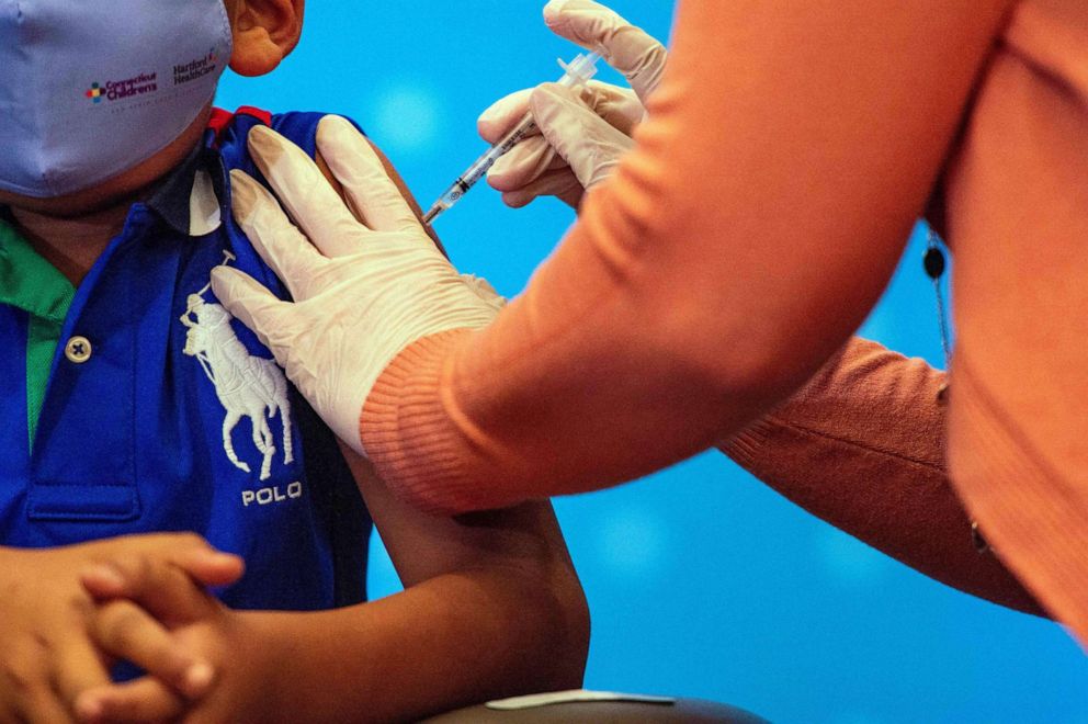 PHOTO: A child receives the Pfizer-BioNTech Covid-19 vaccine in Hartford, Connecticut on November 2, 2021.