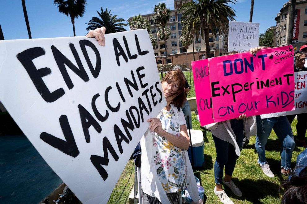 PHOTO: Protesters rally in opposition of vaccination mandate for students outside the school district office in Los Angeles, May 10, 2022.