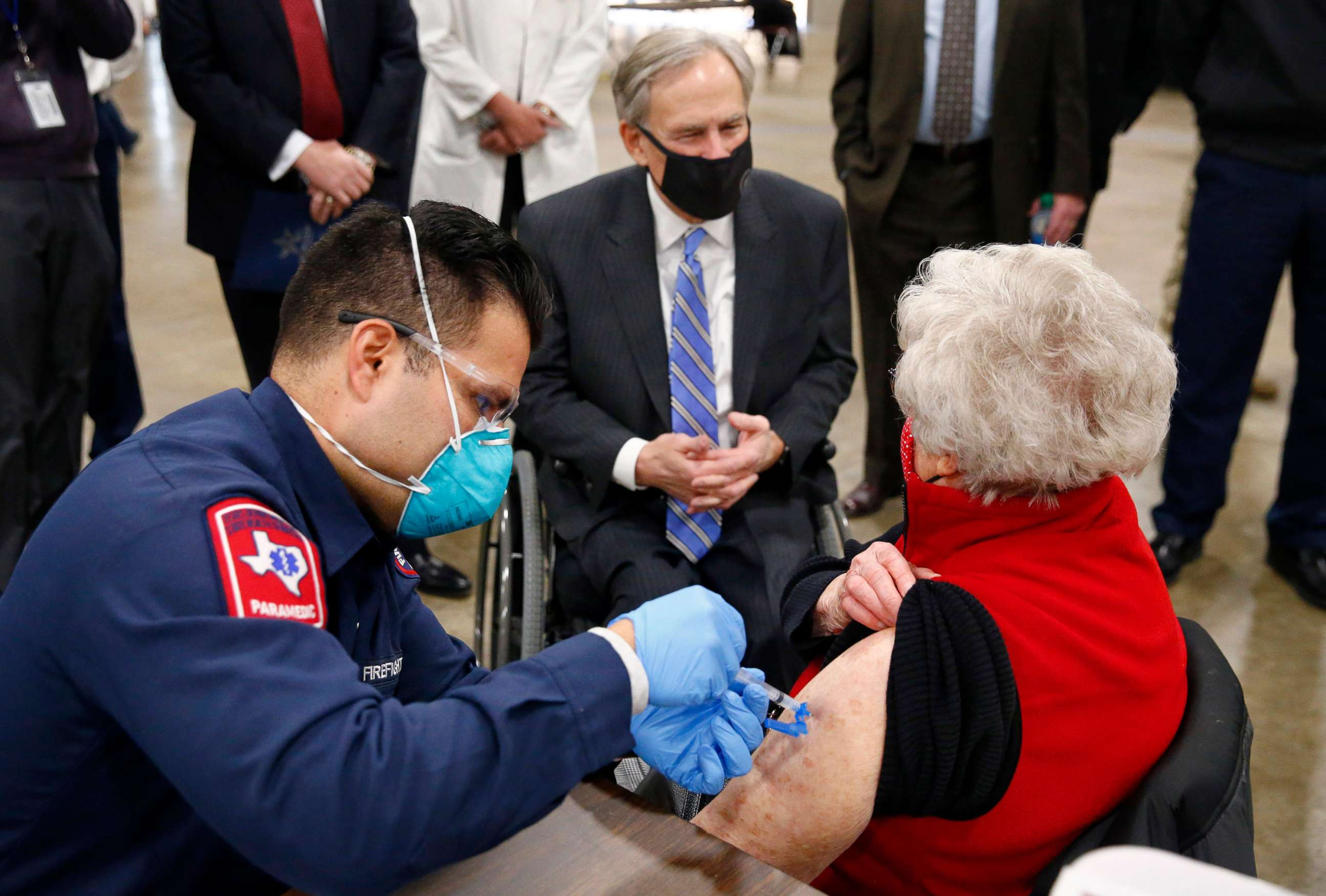 PHOTO: A COVID-19 shot is administed at a mass vaccination site inside the Esports Stadium Arlington & Expo Center in Arlington, Texas, Jan. 11, 2021.