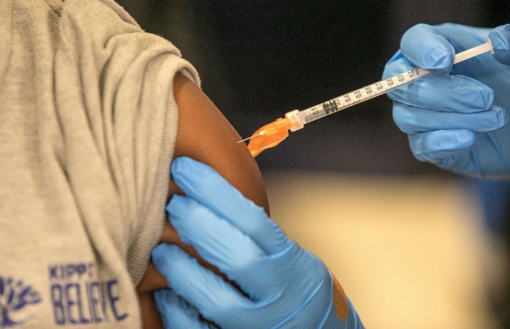PHOTO: Medical personnel vaccinate students at KIPP Believe Charter School in New Orleans, Jan. 25, 2022.