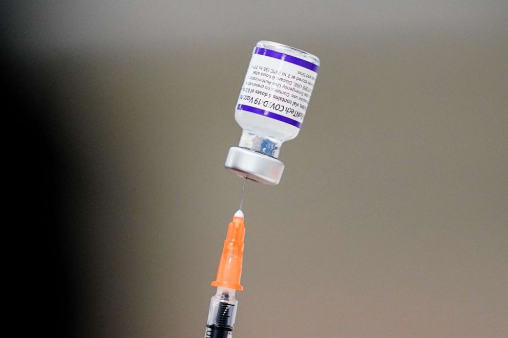PHOTO: A syringe is prepared with the Pfizer COVID-19 vaccine at a vaccination clinic at the Keystone First Wellness Center in Chester, Pa., Dec. 15, 2021.