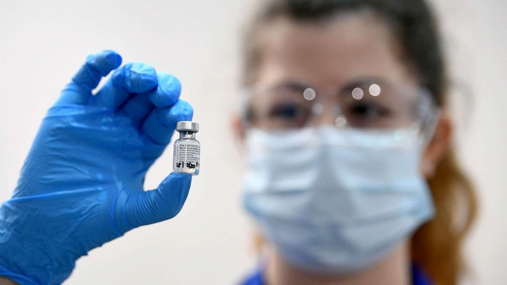PHOTO: A member of medical staff holds a phial of the Pfizer/BioNTech COVID-19 vaccine at Guy's Hospital, on the first day of the largest immunization program in the British history, in London, Dec. 8, 2020.
