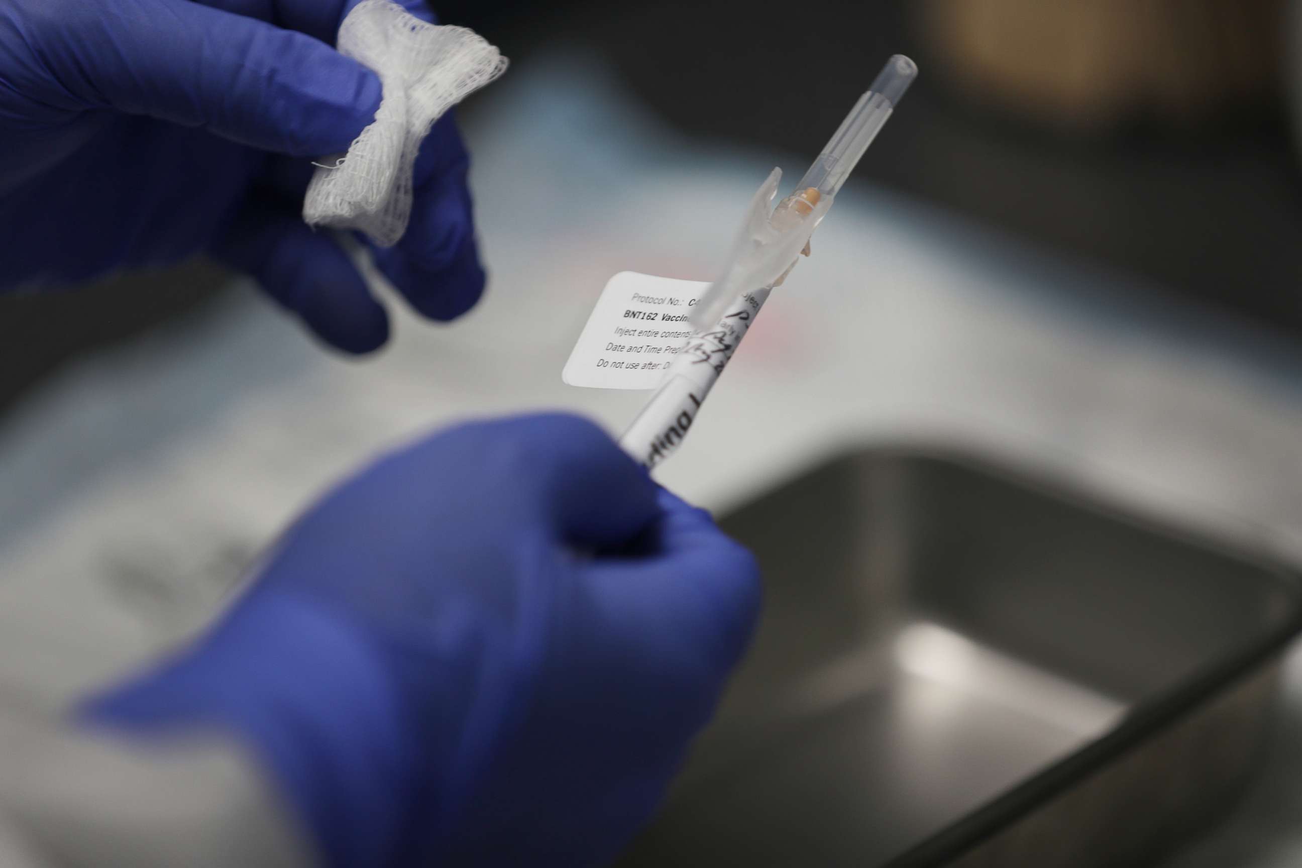 PHOTO: Nurse Jose Muniz prepares a COVID-19 vaccination at Research Centers of America on Aug. 7, 2020, in Hollywood, Fla.